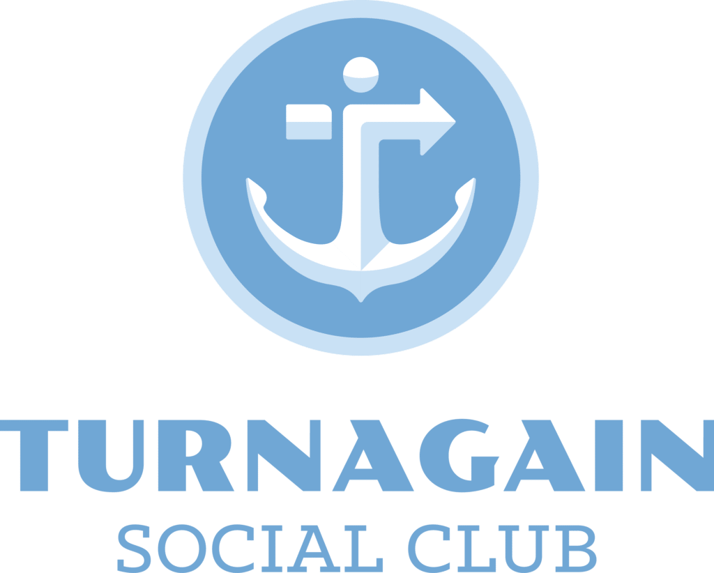 Blue anchor logo with Turnagain Social Club text below in two shades of blue.